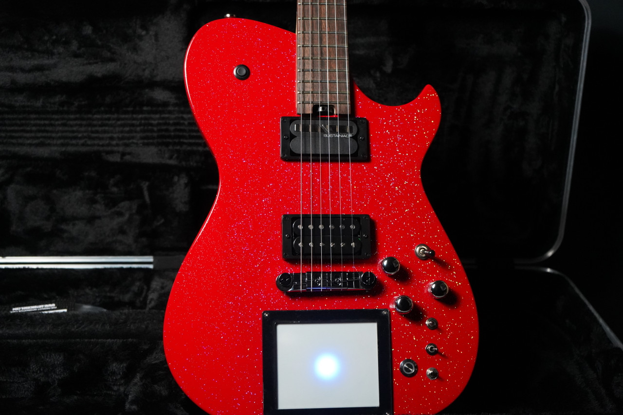 Cort Manson MBM-1 Electric Guitar in Red Santa finish â€“ signature model featuring integrated Kaoss Pad, Sustainiac pickup system, and ergonomic modern body design