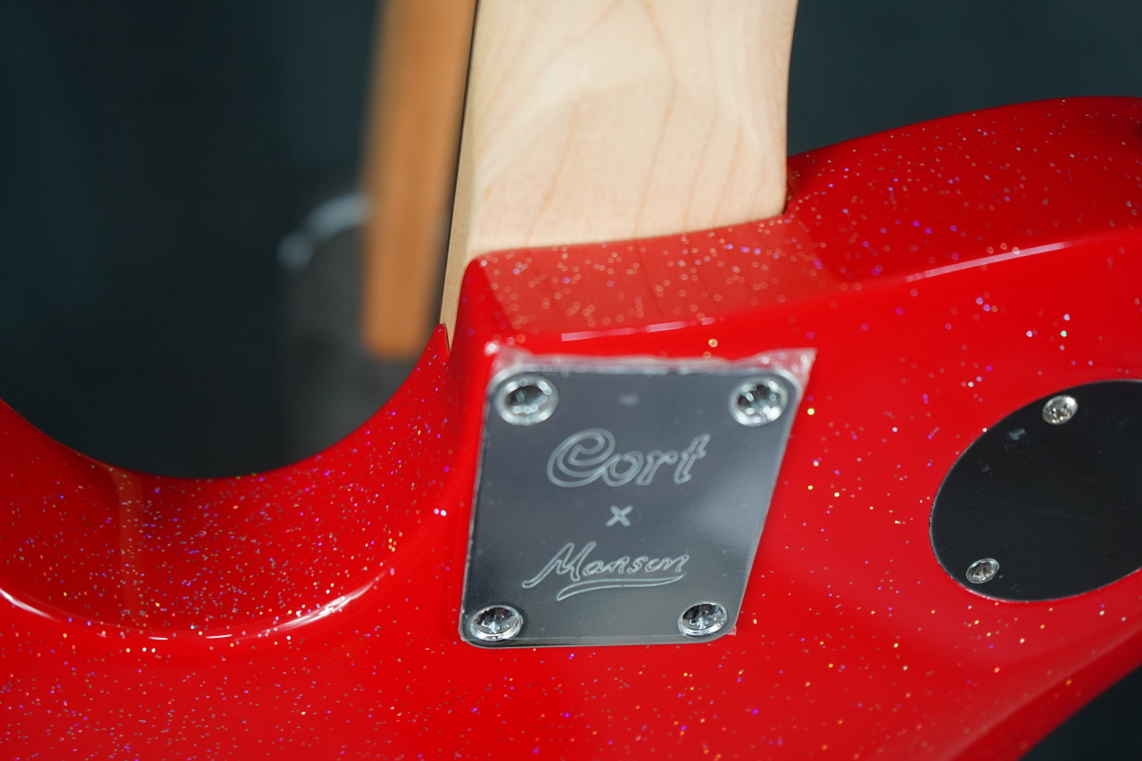 Cort Manson Matt Bellamy Red Santa Electric Guitar – signature model featuring Sustainiac pickup, sleek red finish, and Manson-designed body with modern tone controls