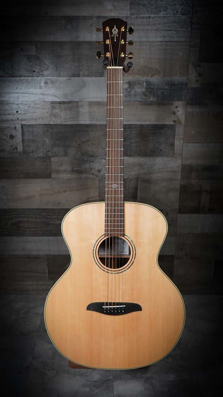 The Alvarez Yairi YB70 Standard Baritone Acoustic Guitar (YB70) features all-solid construction and a long baritone scale length designed for extended low-end response. Handcrafted in Japan, it delivers deep, powerful bass, clear articulation, and excellent sustainÃ¢â‚¬â€ideal for alternate tunings, modern acoustic arrangements, and players seeking expanded tonal range with premium Yairi craftsmanship.