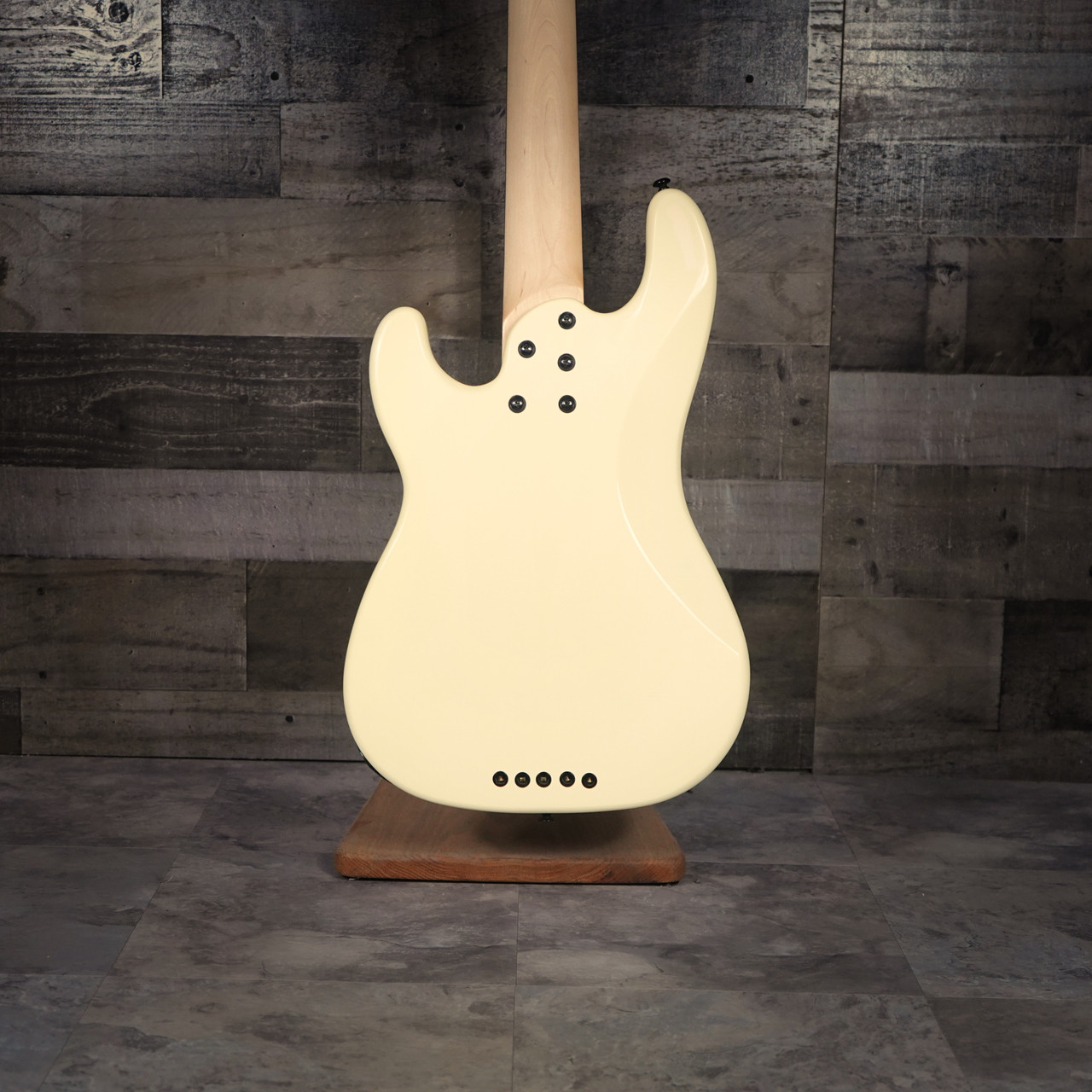 Schecter P-5 Ivy 5-string electric bass featuring a sleek ivy green finish, classic P-style body, powerful pickups, smooth-playing neck, and extended low-range performance.