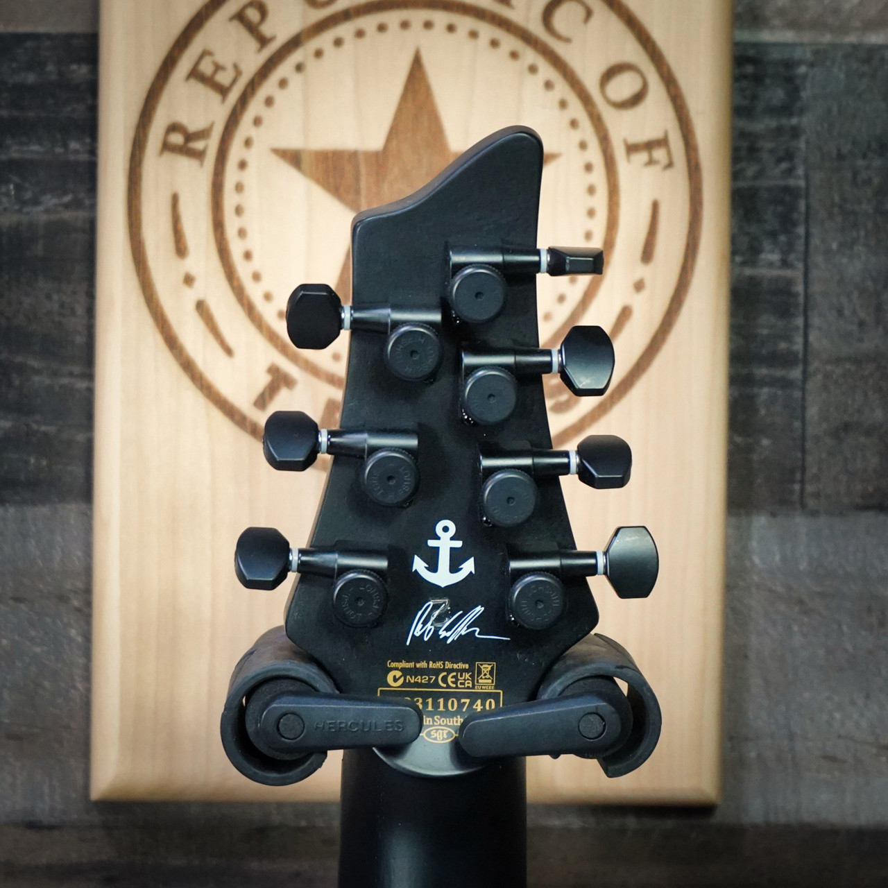 Schecter C-7 Contrasts Rob Scallon 7-String Multiscale guitar featuring a dual white/black finish, multi-scale ebony fingerboard, signature pickups, lightweight body, and signature Rob Scallon design elements.