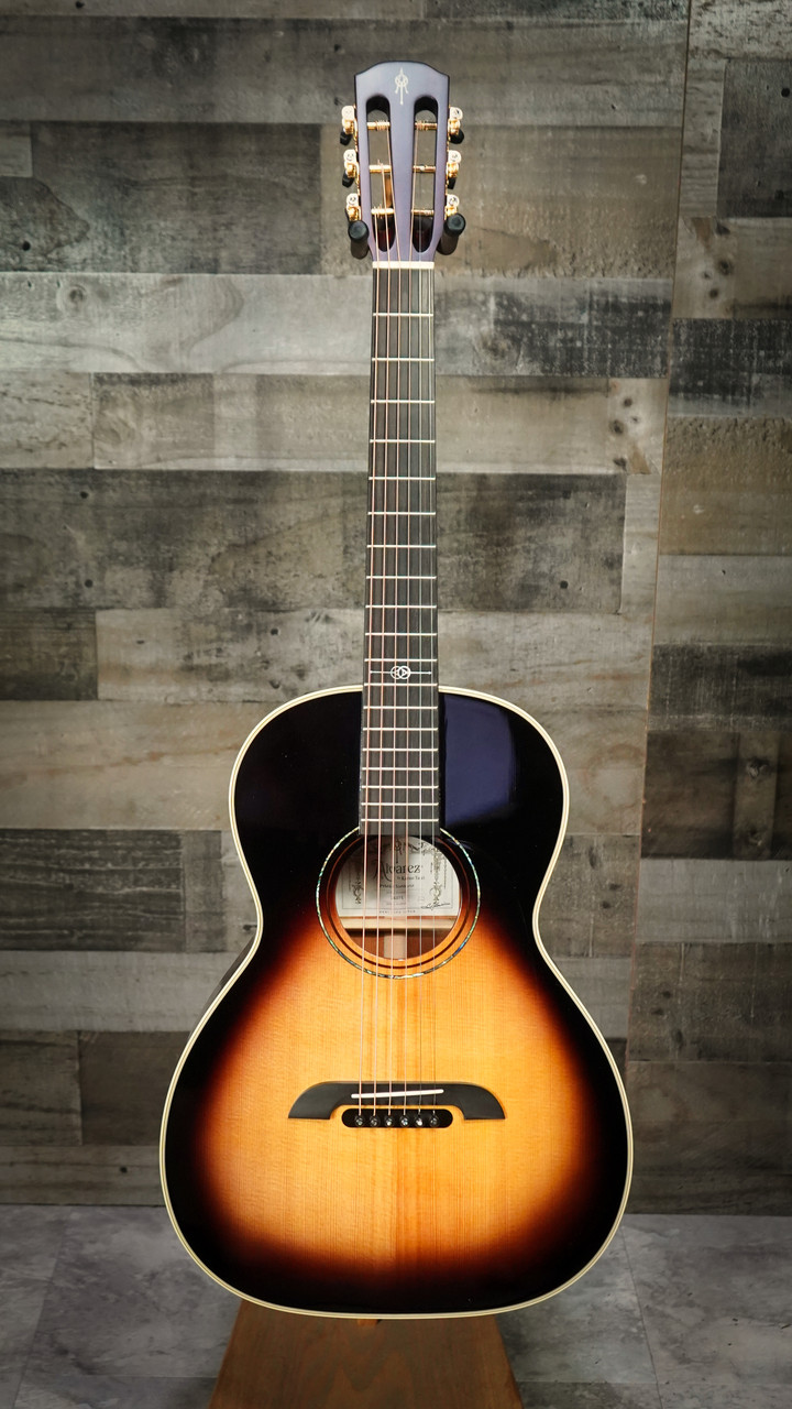 The Yairi Masterworks PYM60 Sunburst is an all-solid parlor acoustic guitar handcrafted in Japan, featuring a solid spruce top, solid mahogany back and sides, and Yairiâ€™s advanced FST6 bracing. The compact parlor body produces a warm, focused voice with exceptional clarity, while the vintage-inspired sunburst finish adds classic appeal. Ideal for fingerstyle, blues, folk, and intimate studio work.