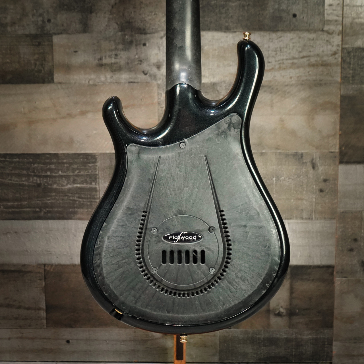 Flaxwood Rautia Electric Guitar in Glossy Black finish with gold hardware – used model showing single-cut body design and handcrafted Finnish build quality