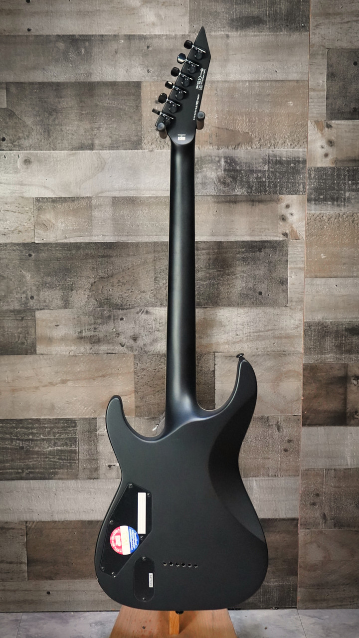 ESP LTD MH-1000 Baritone Electric Guitar in Black Satin finish – front angled view showing double-cutaway body, EMG pickups, and 27" scale neck