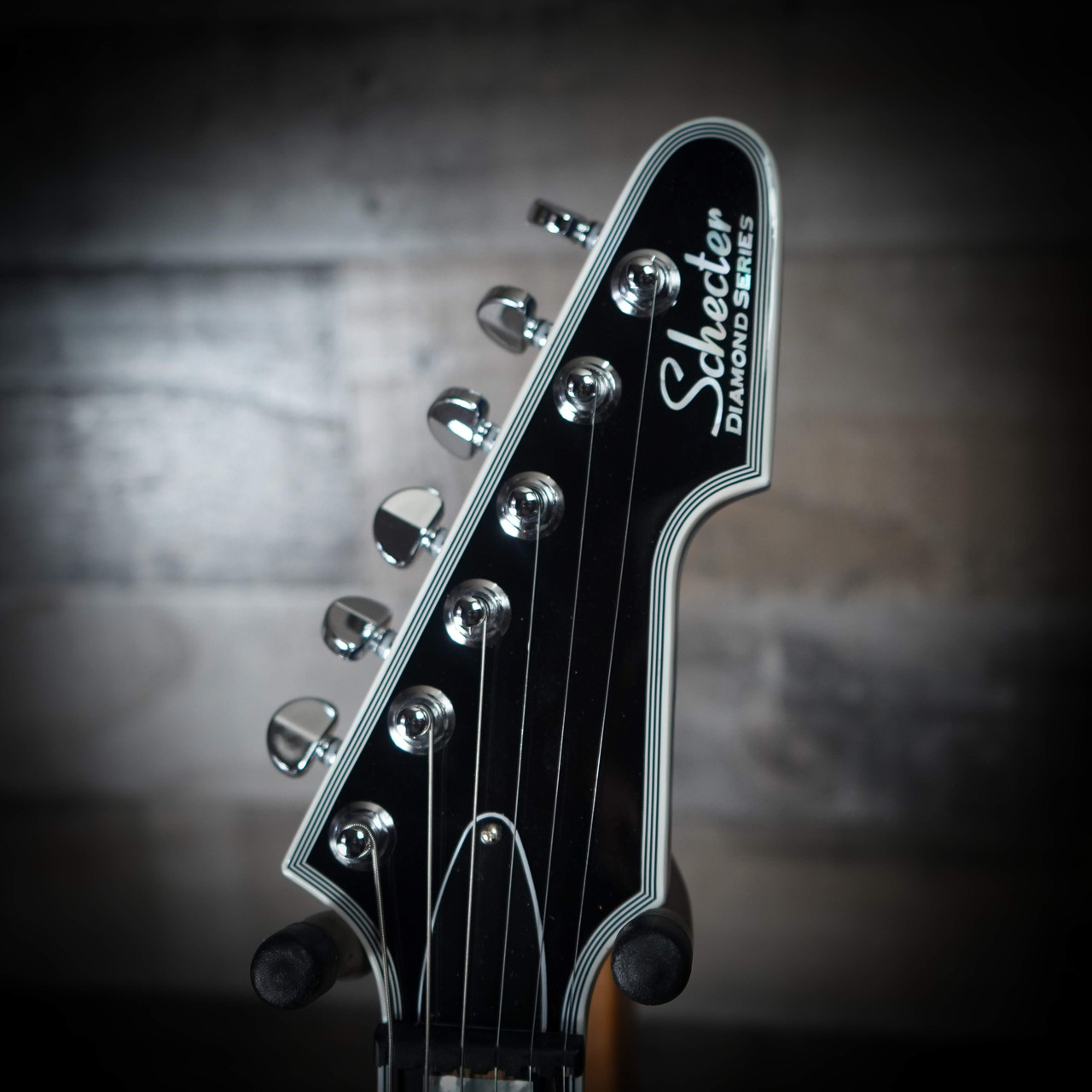 The Schecter E-1 Electro Resin (603) showcases a unique Yellow Electro Resin/Natural finish over a dramatically shaped E-1 body. Its eye-catching resin top provides a boutique look, while the lightweight body and thin-C neck ensure fast, comfortable playability. Equipped with powerful Schecter humbuckers, this guitar delivers tight lows, cutting highs, and excellent sustainÃ¢â‚¬â€ideal for modern rock, metal, and players wanting a standout stage instrument.