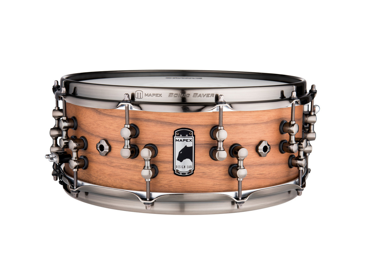 Mapex Black Panther Design Lab Machine 14" x 5.5" Snare Drum – Natural Satin (BPDLMW4550LNW) featuring a maple/walnut hybrid shell for balanced warmth, clarity, and dynamic response.