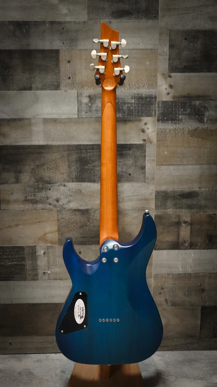 The Schecter C-1 Standard Plus (3937) features a beautifully figured quilted maple top dressed in a vivid Blue Fade finish, delivering boutique looks with powerful performance. A fast Thin-C neck, Diamond Series humbuckers, and reliable hardware provide articulate tone, strong sustain, and modern comfortÃƒÂ¢Ã¢â€šÂ¬Ã¢â‚¬Âideal for players seeking a stylish and versatile guitar for rock, metal, and beyond.