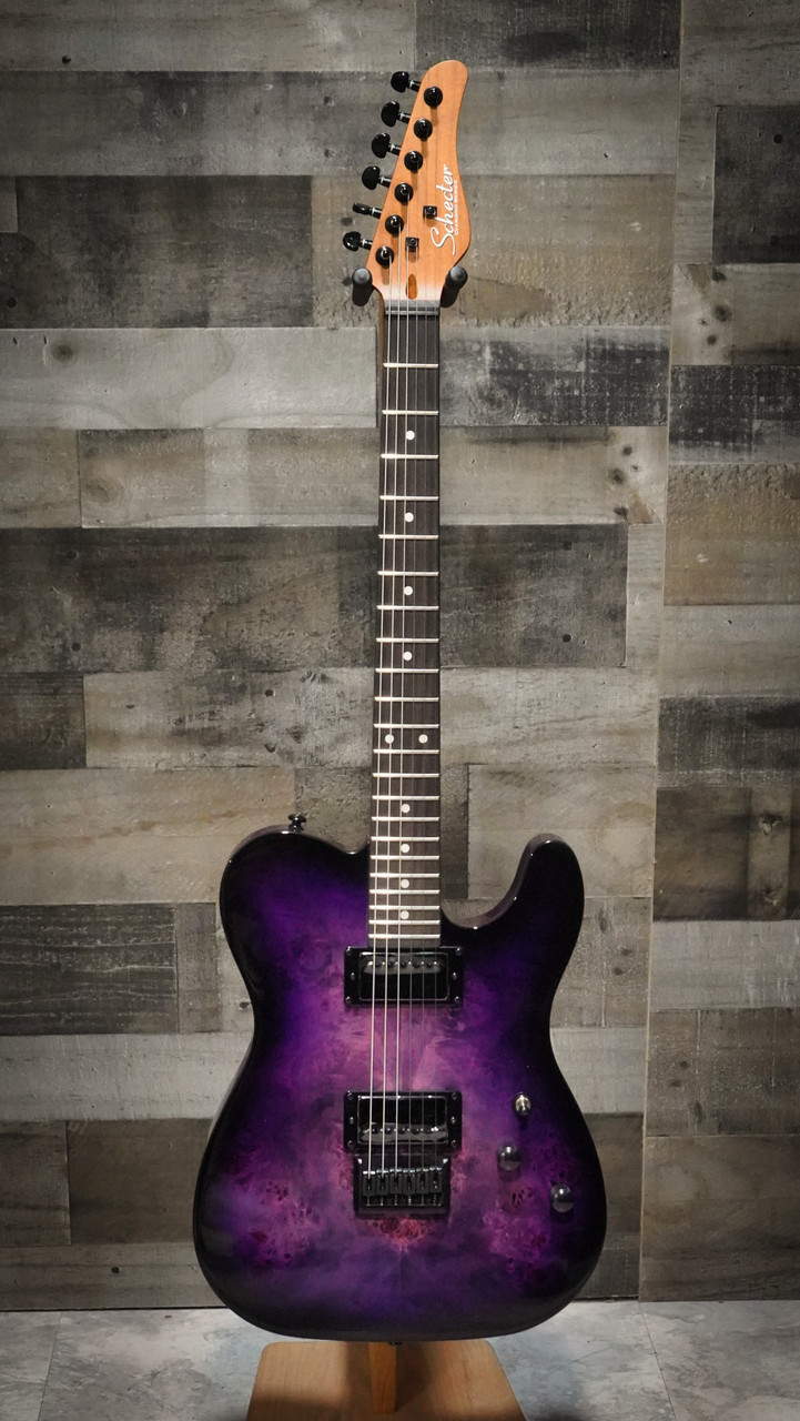 The Schecter PT Standard (3956) showcases a stunning burl top finished in Purple Burst, giving it boutique-level visual appeal. A comfortable Thin-C neck paired with Diamond Series pickups delivers crisp twang, tight lows, and rich midrange ideal for multiple genres. The P-s classic T-style silhouette combined with Schecterâ€™s modern build quality makes it a versatile, stage-ready instrument.