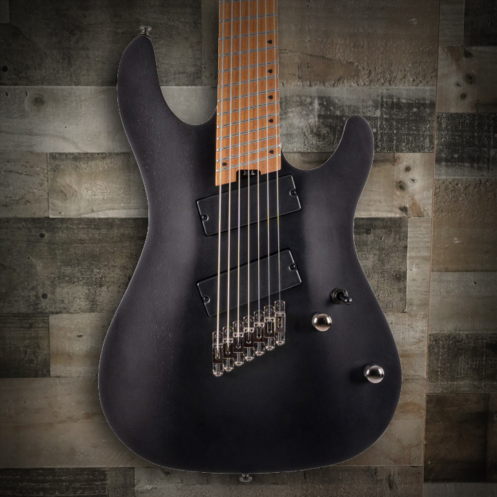 Cort KX Series Multi-Scale 7-String Electric Guitar in Open Pore Black finish â€“ solid-body extended-range design with fanned frets and dual humbuckers