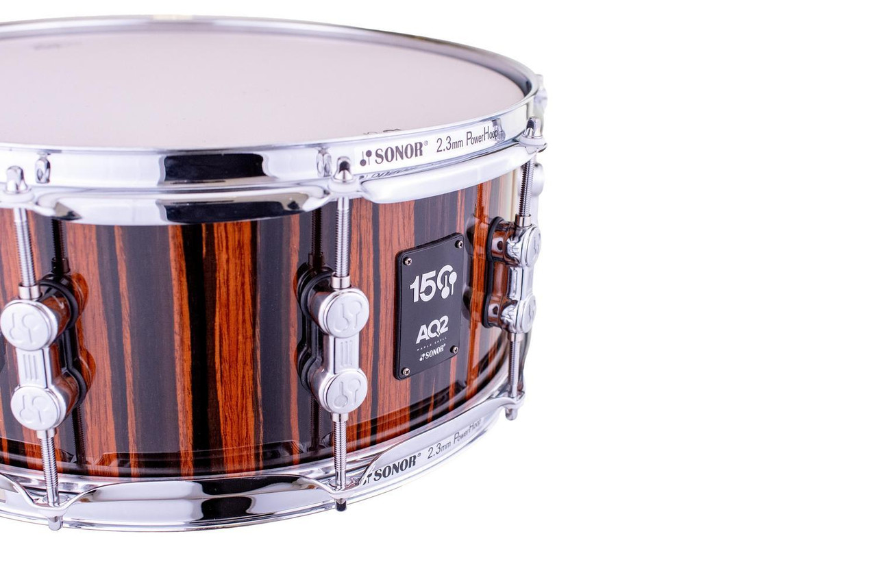 Sonor AQ2 150th Anniversary Shell Set â€“ High Gloss Ebony Veneer (AQ2-Sonor ANN-WMCEBN) featuring hybrid maple/birch shells, chrome hardware, and limited-edition anniversary badging