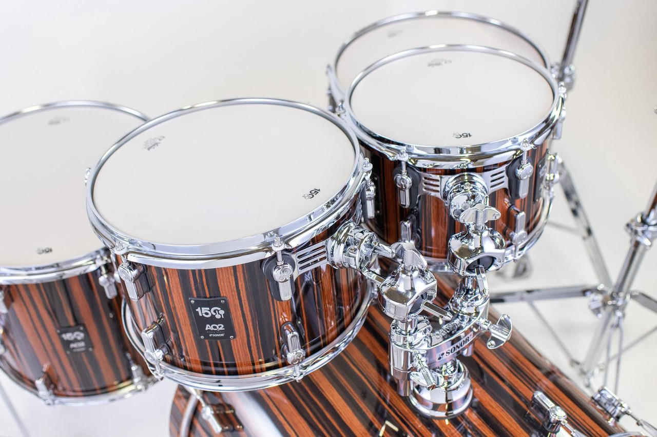 Sonor AQ2 150th Anniversary Shell Set – High Gloss Ebony Veneer (AQ2-Sonor ANN-WMCEBN) featuring hybrid maple/birch shells, chrome hardware, and limited-edition anniversary badging