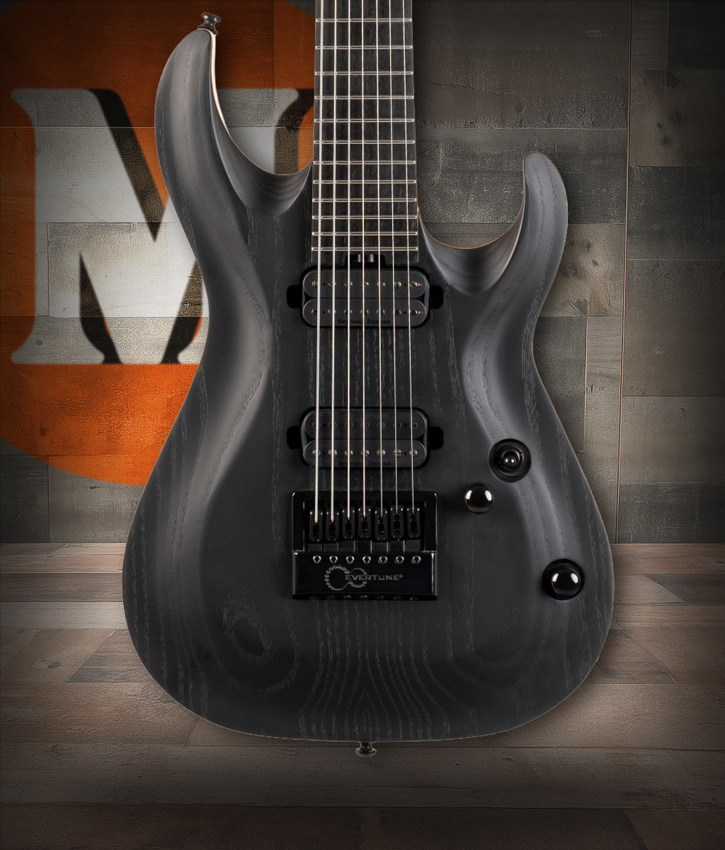 Cort KX707 EverTune 7-String Electric Guitar in Open Pore Black finish with EMG 707 pickups and EverTune bridge.