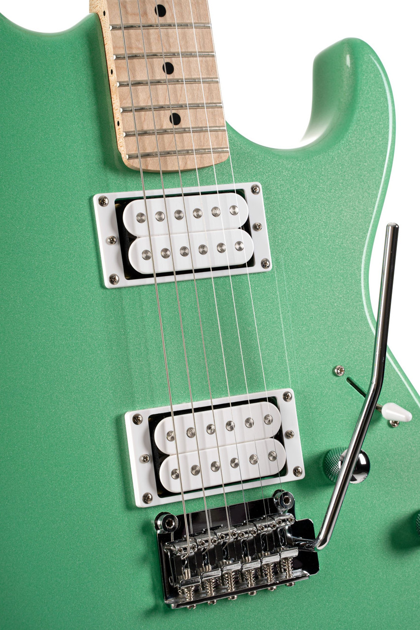 Cort G250SMEG Spectrum Double Cutaway Electric Guitar in Metallic Green finish with roasted maple neck and HSS pickups.