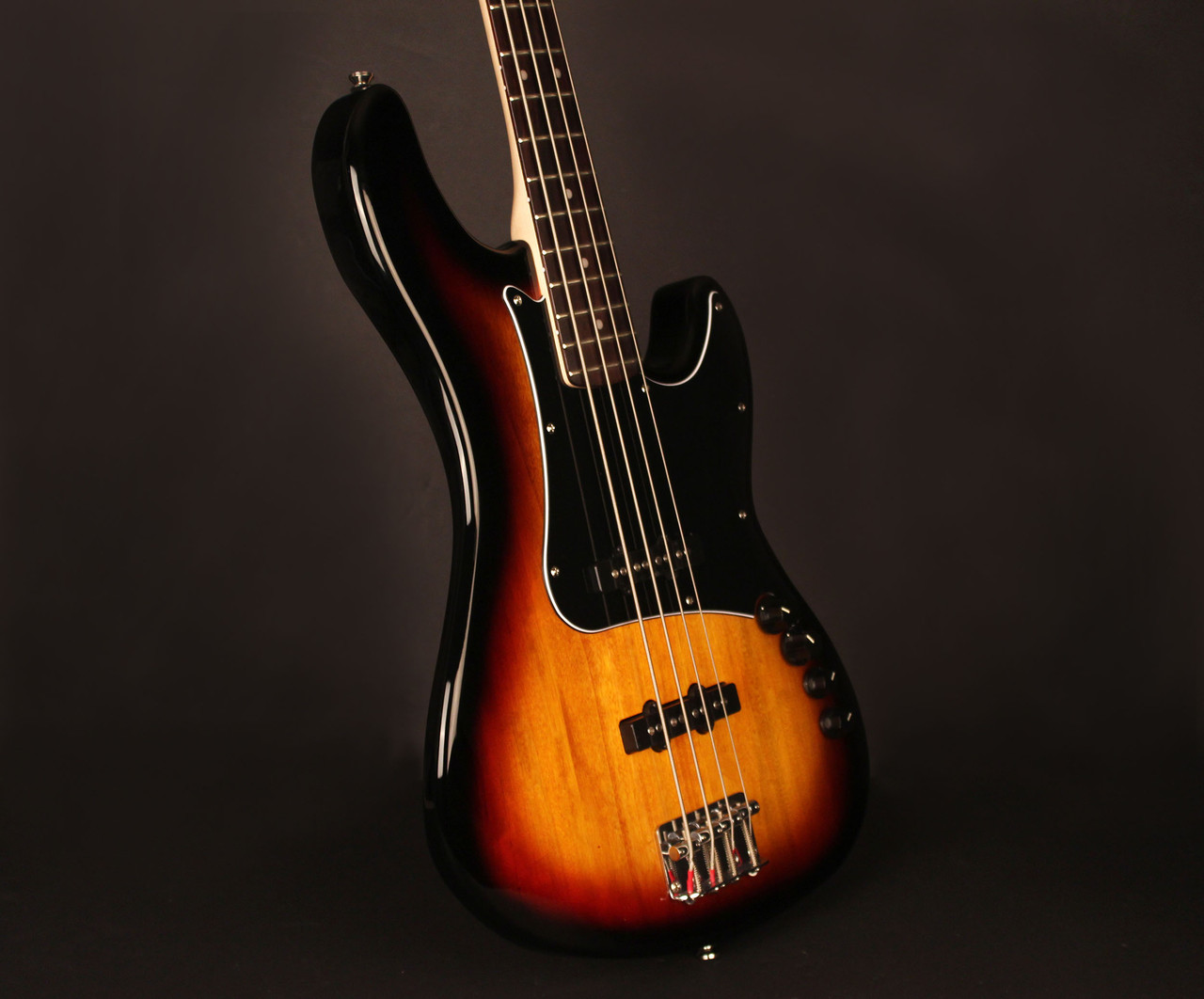 Cort GB34JJ3TS GB Series 4-String Bass Guitar in 3 Tone Sunburst finish with dual J-style pickups and active 2-band EQ.