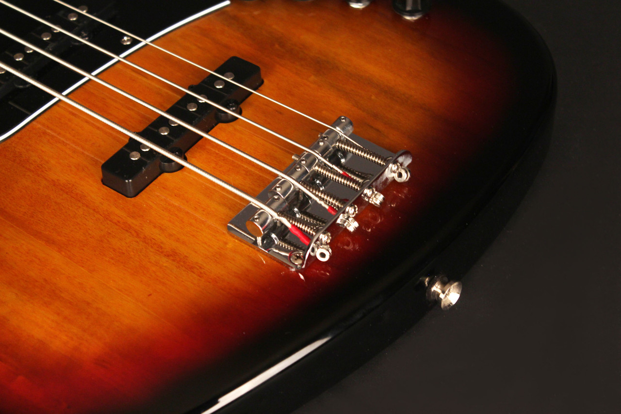 Cort GB34JJ3TS GB Series 4-String Bass Guitar in 3 Tone Sunburst finish with dual J-style pickups and active 2-band EQ.