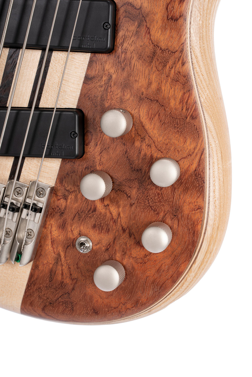 Cort A5BEYONDOPBN Artisan Series A5 Beyond 5-String Bass Guitar featuring Bubinga top, neck-through construction, Bartolini pickups, and Open Pore Natural finish – available at Musician Madness.