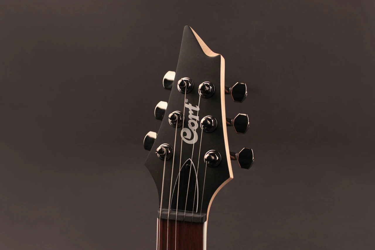 Cort KX300OPCB KX Series Electric Guitar in Open Pore Cobalt Burst finish featuring mahogany body, dual humbuckers, and sleek modern design â€“ available at Musician Madness.