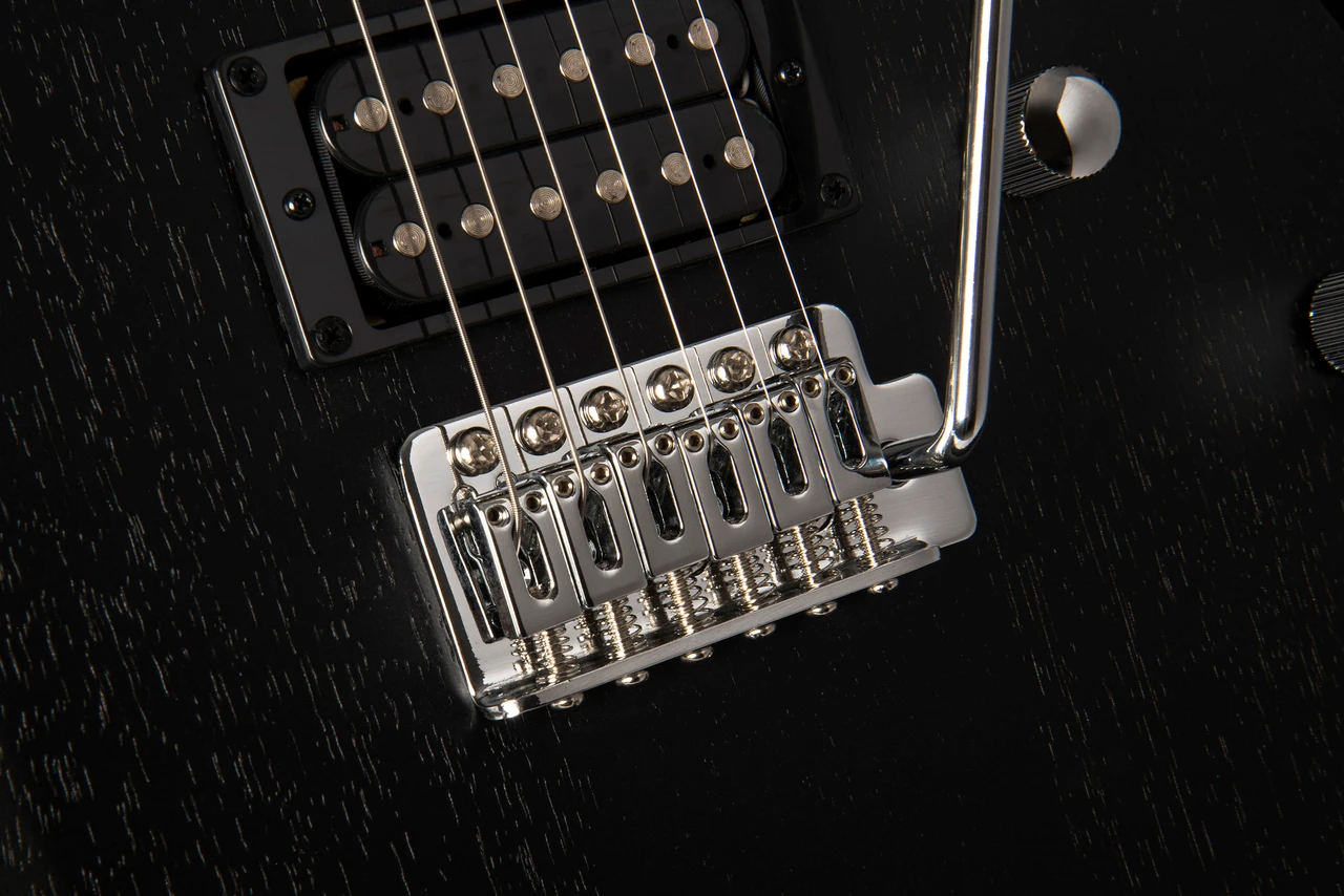 Cort X100OPBK X Series 100 Double Cutaway Electric Guitar in Open Pore Black finish featuring dual humbuckers, fast neck, and modern styling â€“ available at Musician Madness.