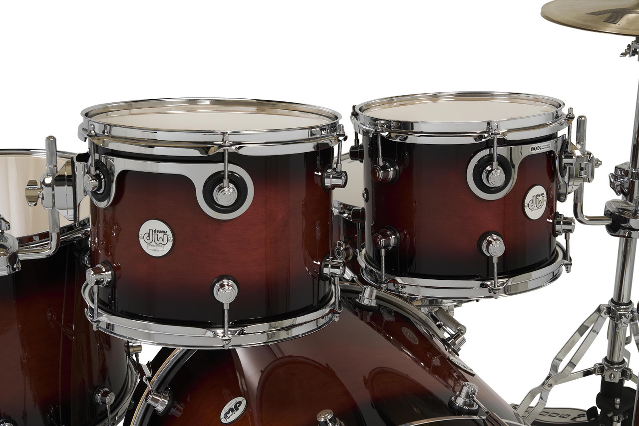 DW Design Series 4-Piece Maple Shell Pack in Tobacco Burst finish with chrome hardware featuring maple shells, pro DW tone, and stunning craftsmanship – available at Musician Madness.