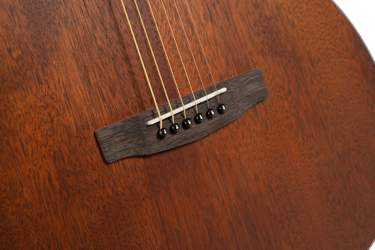 Cort L60MOP Luce Series L60 M Orchestra Acoustic Guitar featuring a solid spruce top, mahogany back and sides, and an open pore finish for natural tone and resonance.