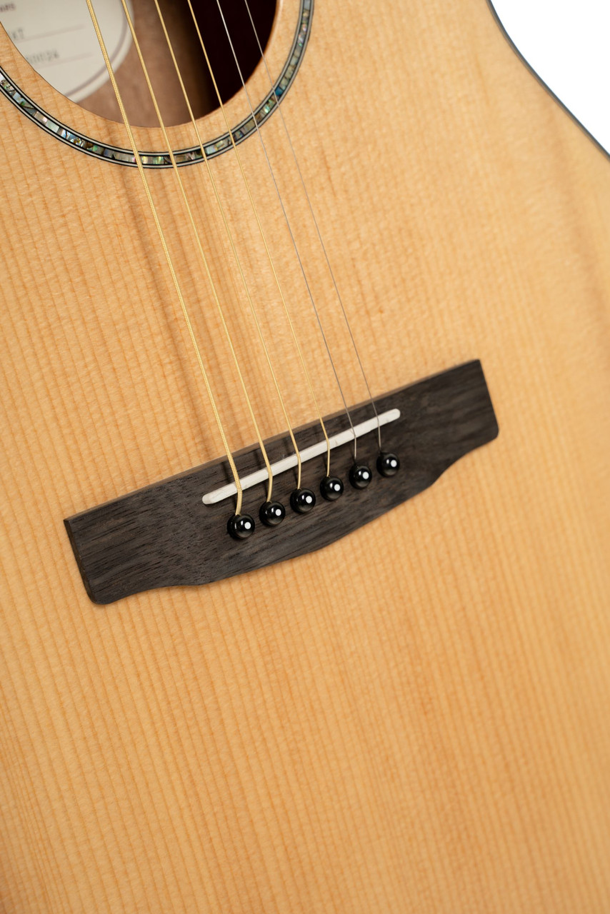 Cort L60NAT Luce Series L60 Orchestra Acoustic Guitar featuring a solid spruce top, mahogany back and sides, and a natural gloss finish for warm tone and timeless appeal.