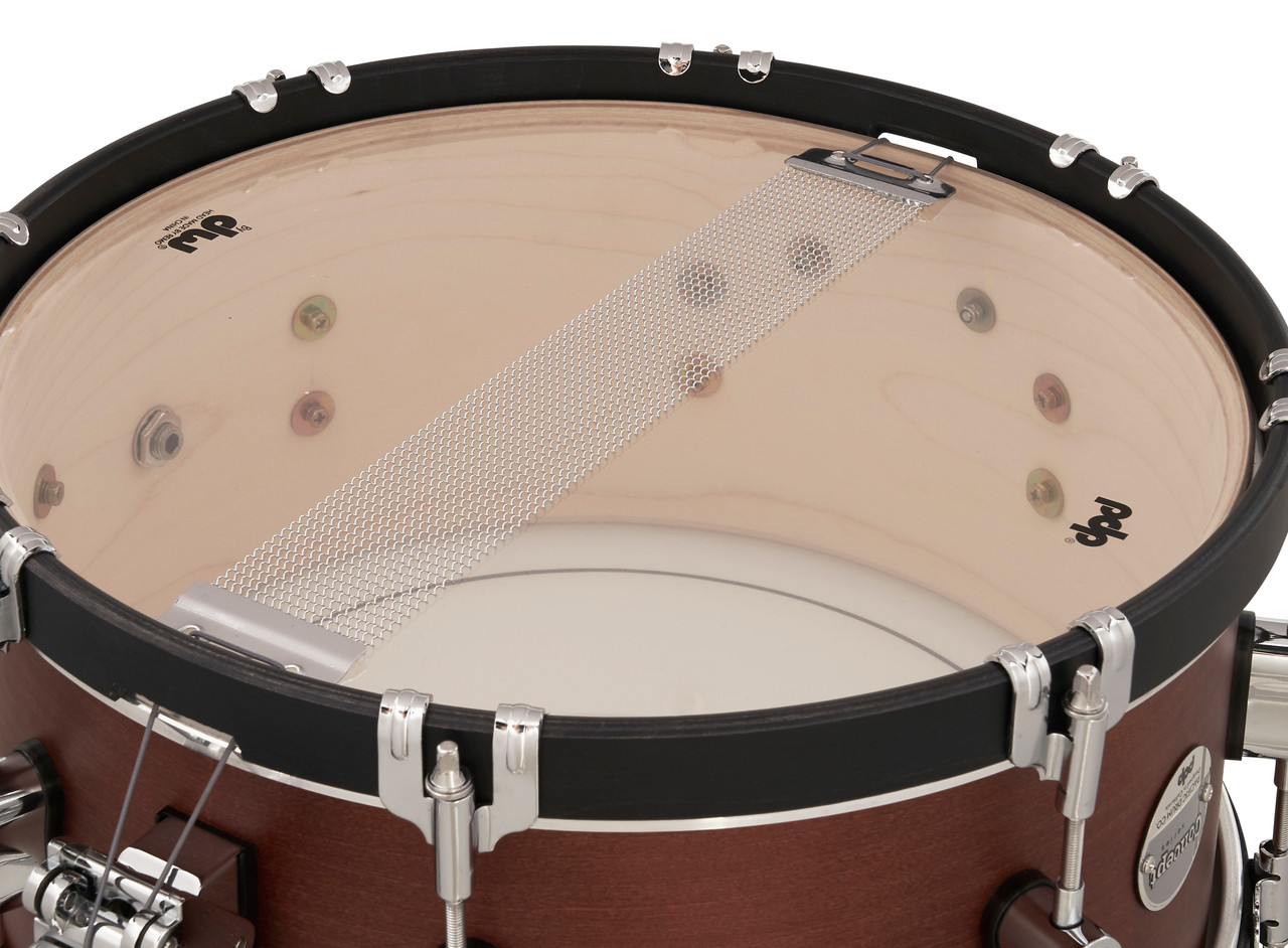 PDP Concept Classic 6.5x14 Snare Drum in deep Ebony Stain finish with matching wood hoops and maple shell, delivering classic tone and elegant design.