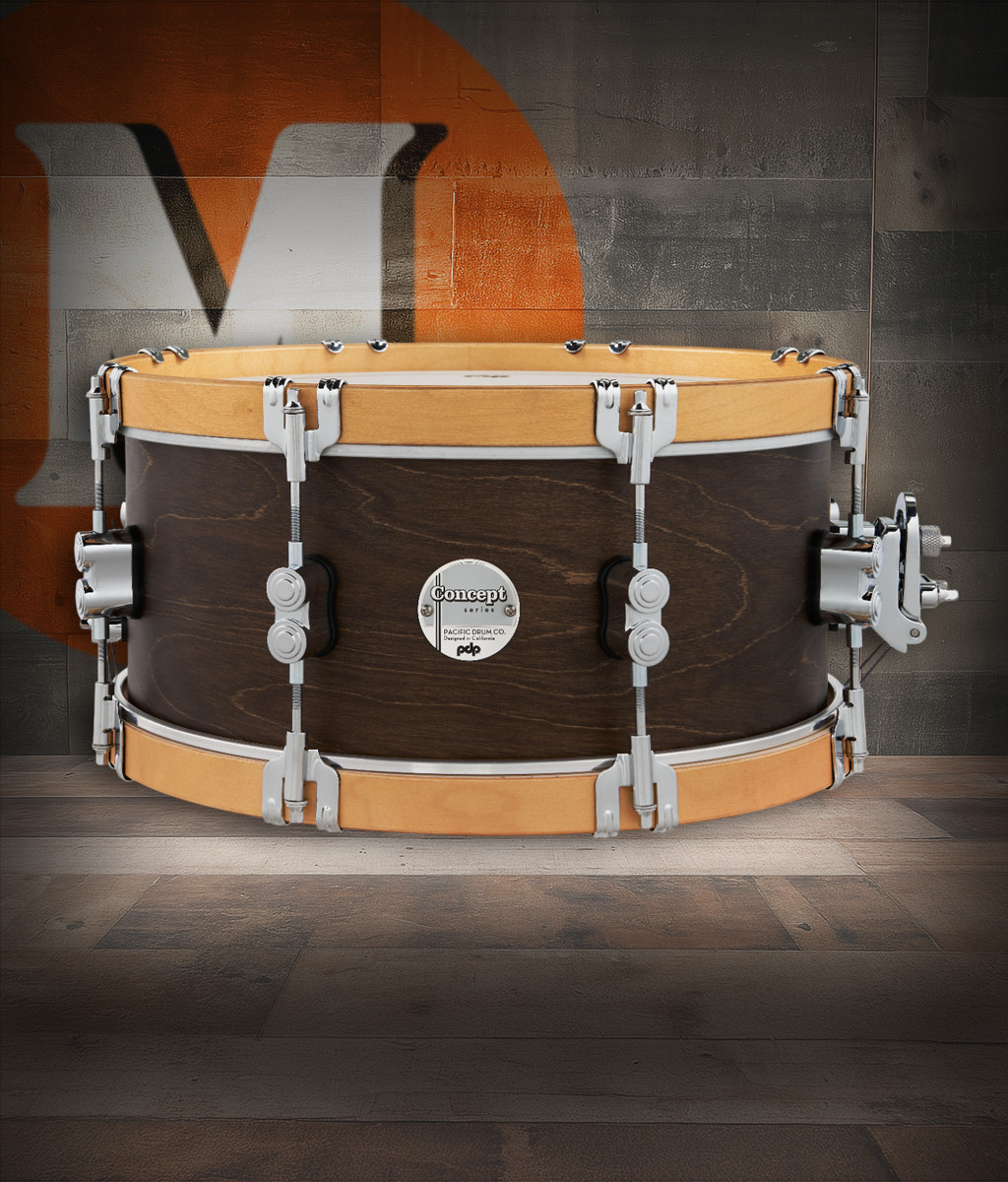 PDP Concept Classic 6.5x14 Snare Drum in Walnut Stain finish with natural wood hoops and maple shell, offering vintage tone and elegant contrast.