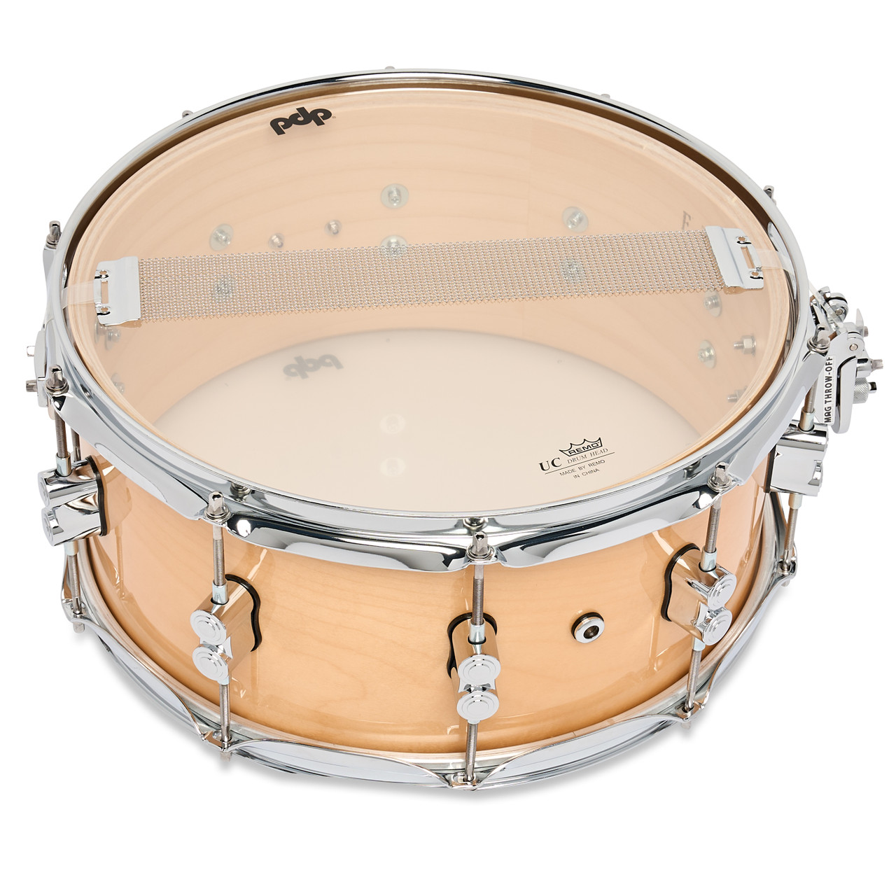 PDP Concept Maple 6.5x14 Snare Drum in Natural Lacquer finish with maple shell and chrome hardware, offering warm tone and timeless appeal.