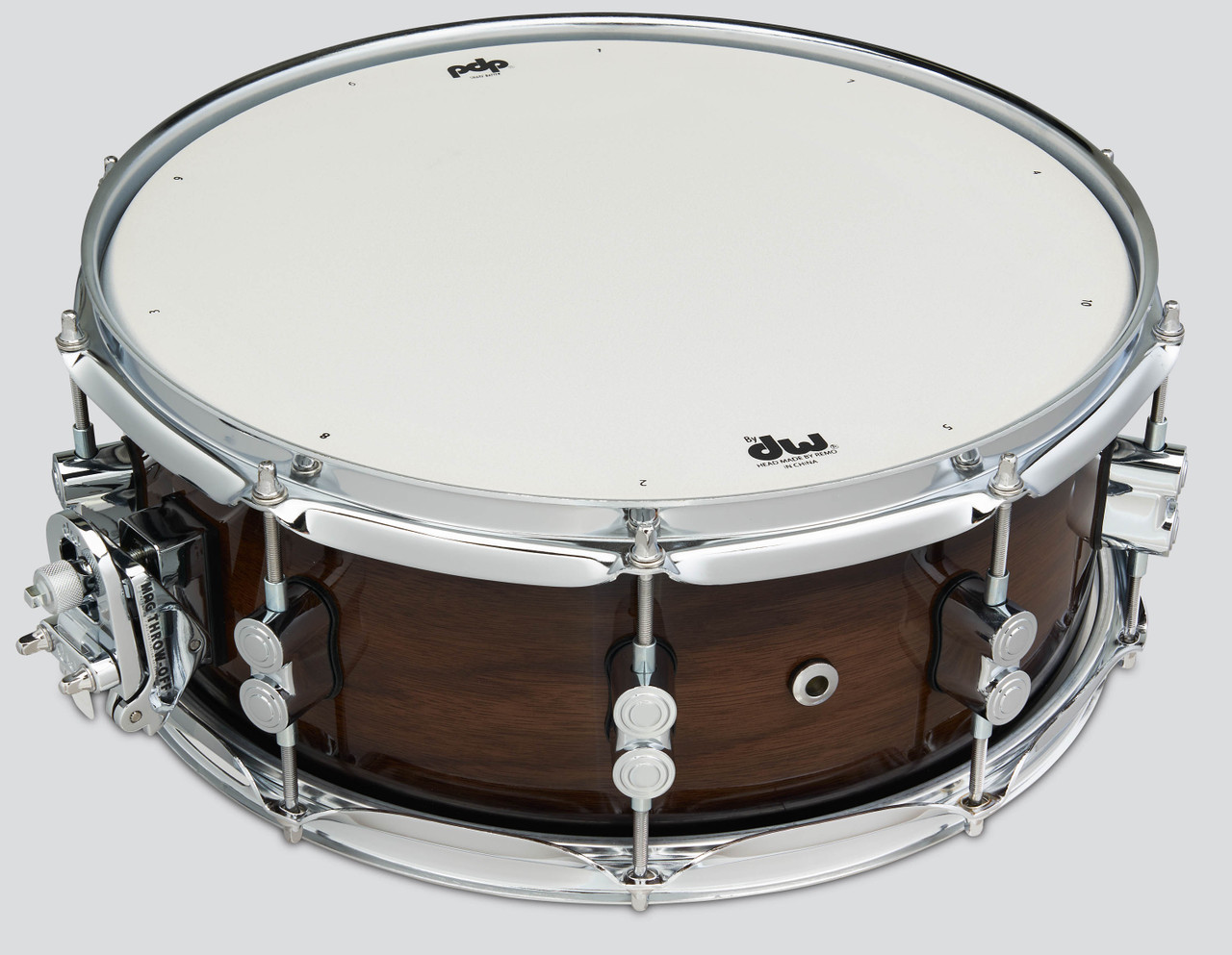 PDP Concept Maple Exotic 5.5x14 Snare Drum in Walnut to Charcoal Burst Lacquer finish with maple shell and chrome hardware, offering rich tone and elegant burst style.