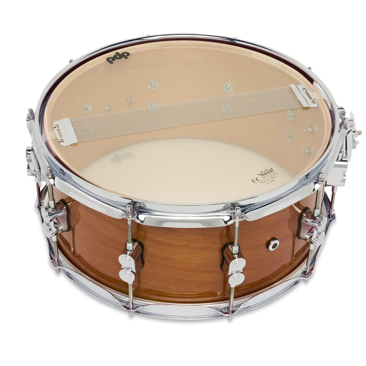 PDP Concept Maple Exotic 6.5x14 Snare Drum in Natural Honey Mahogany Lacquer finish with maple shell and chrome hardware, producing rich tone and striking exotic look.