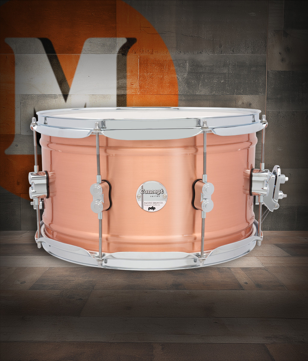 PDP Concept Series 8x14 Snare Drum in Natural Satin Brushed Copper with 1.2mm shell and chrome hardware, producing warm tone, crisp response, and bold metallic style.