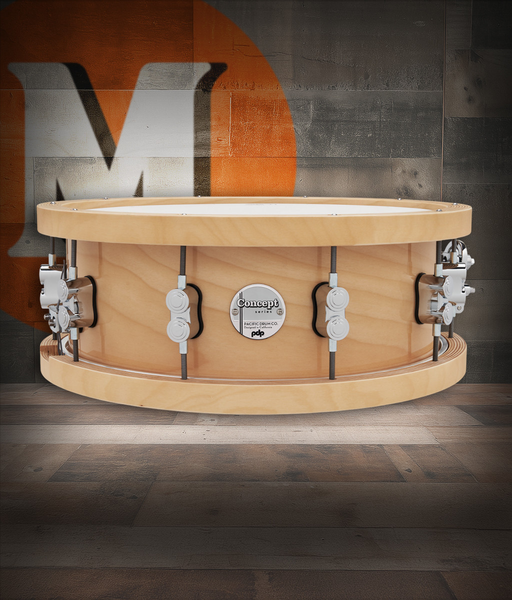 PDP Concept 20-Ply 5.5x14 Snare Drum in Natural Maple finish with thick wood hoops and maple shell, delivering warm tone and exceptional projection.