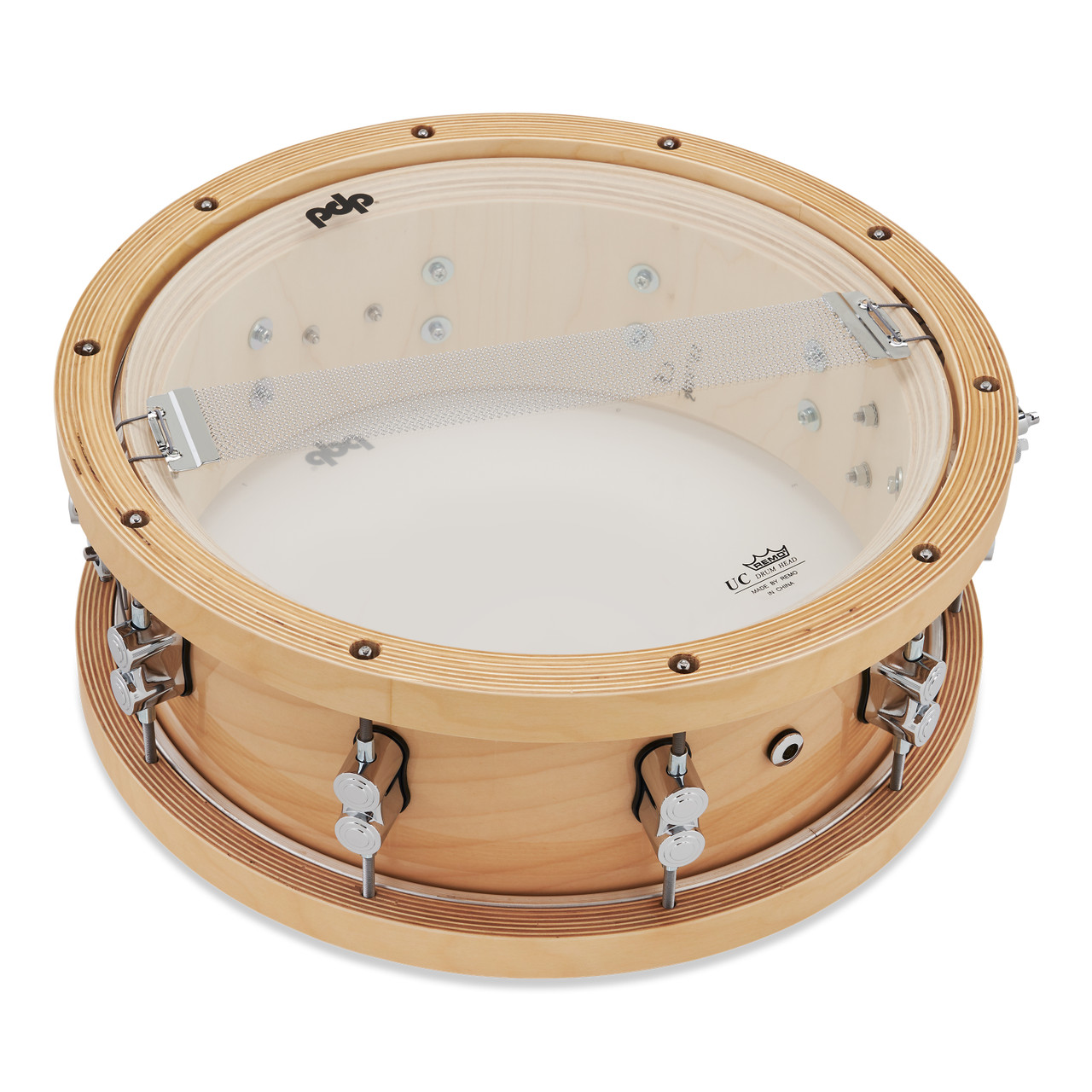 PDP Concept 20-Ply 5.5x14 Snare Drum in Natural Maple finish with thick wood hoops and maple shell, delivering warm tone and exceptional projection.