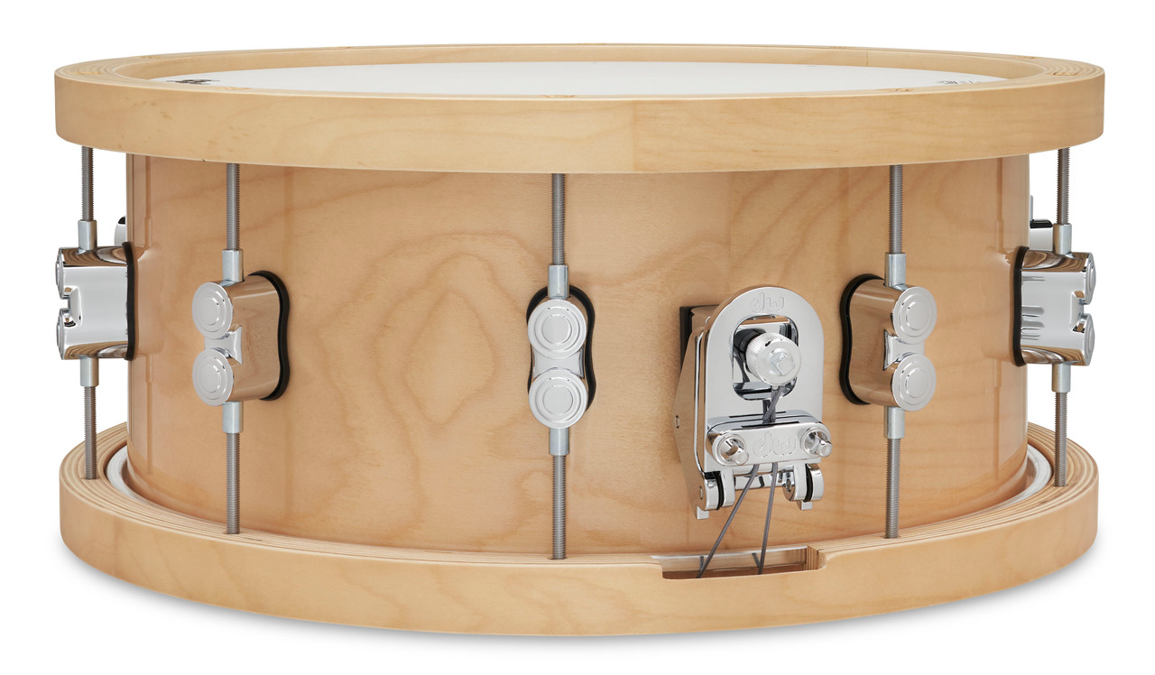 PDP Concept 20-Ply 6.5x14 Snare Drum in Natural Maple finish with thick wood hoops and maple shell, delivering warm tone, crisp attack, and exceptional projection.