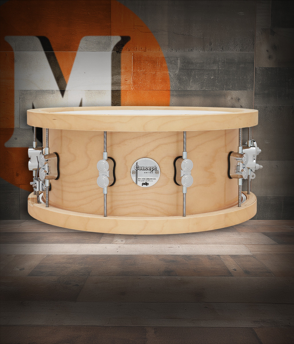 PDP Concept 20-Ply 6.5x14 Snare Drum in Natural Maple finish with thick wood hoops and maple shell, delivering warm tone, crisp attack, and exceptional projection.