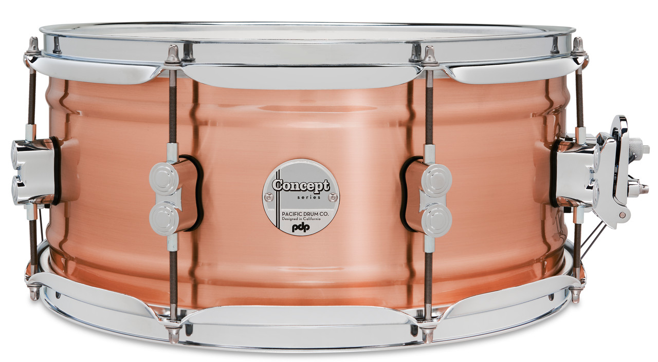 PDP Concept Series 6.5x14 Snare Drum in Natural Satin Brushed Copper finish with 1.2mm shell and chrome hardware, producing warm tone and refined metal resonance.