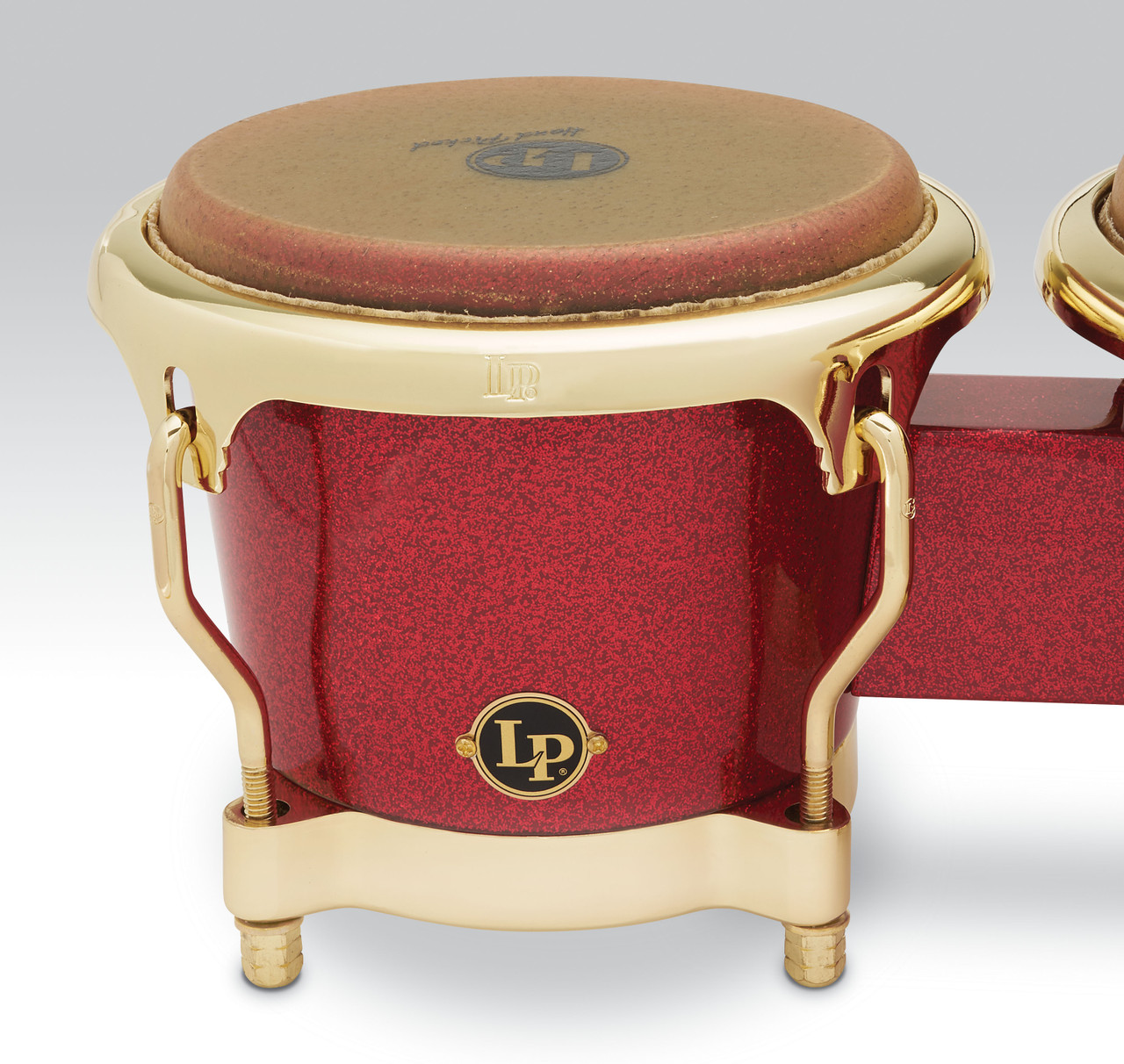 Latin Percussion LP Fausto Cuevas III Signature 7-1/4"–8-5/8" Bongos – Ferrari Red Fiberglass with Gold Hardware (LP794V-ARG) – premium LP signature bongos available at Musician Madness.