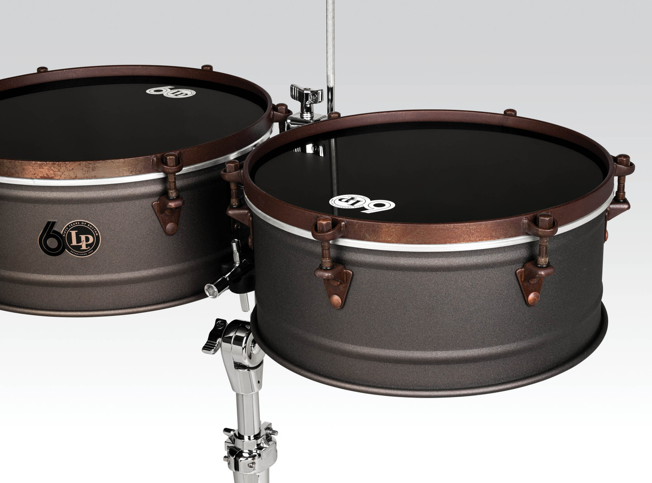 Latin Percussion LP1415-60 60th Anniversary Timbales featuring 14" and 15" antique bronze and rustic bronze shells, premium hardware, and rich articulate tone crafted for experienced Latin and salsa percussionists.