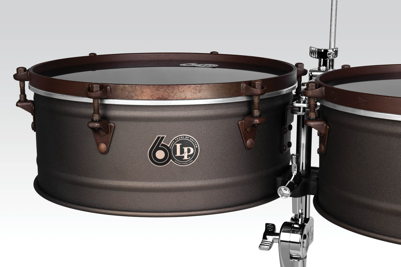 Latin Percussion LP1415-60 60th Anniversary Timbales featuring 14" and 15" antique bronze and rustic bronze shells, premium hardware, and rich articulate tone crafted for experienced Latin and salsa percussionists.