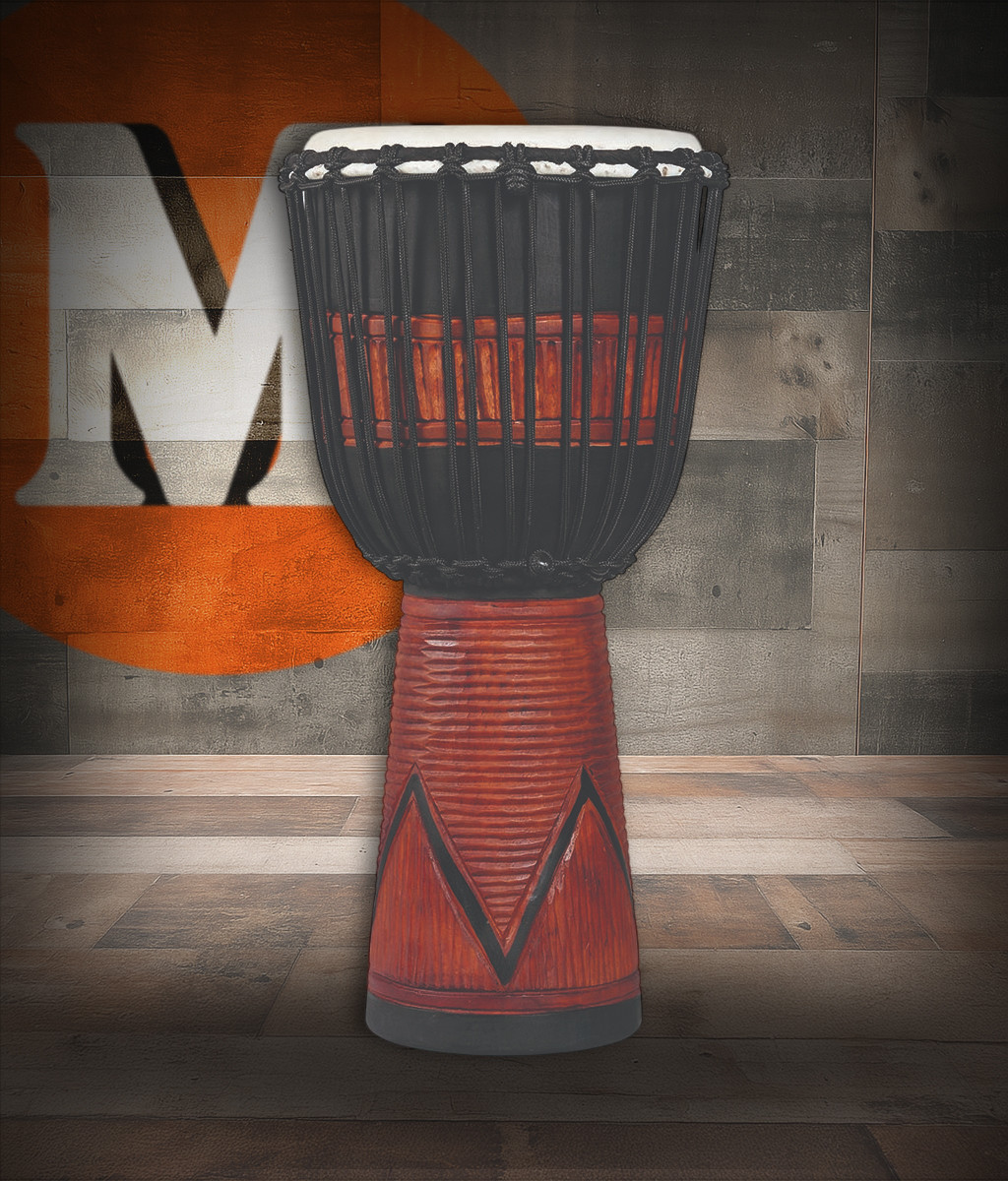 Latin Percussion LP713LB World Beat Wood Art Large Djembe featuring a hand-carved wooden body, black/brown artistic finish, durable rope tuning system, and powerful resonant tone suited for world percussion and group drumming.