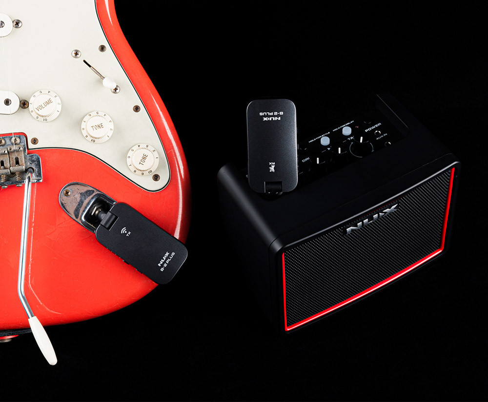 NUX B-2 Plus 2.4GHz Guitar Wireless System featuring a compact transmitter and receiver, high-definition digital audio, ultra-low latency, auto channel selection, and long-lasting rechargeable batteries for guitar and bass players.