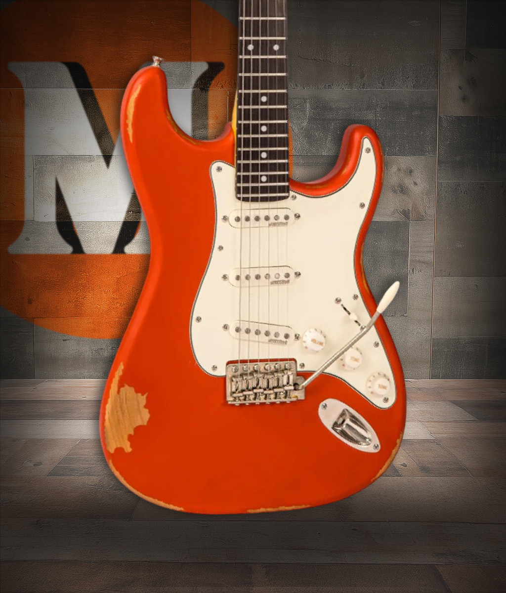 Vintage V6 ICON Electric Guitar in Distressed Firenza Red featuring a relic-style aged finish, Wilkinson hardware and pickups, contoured body design, and vintage-inspired tones ideal for blues, rock, and classic styles.