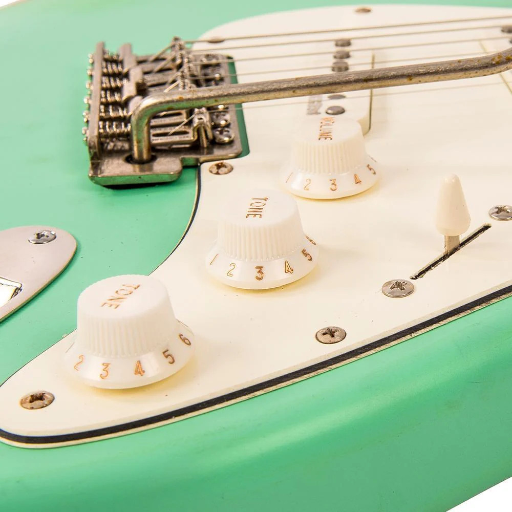 Vintage V6 ICON Electric Guitar in Distressed Ventura Green featuring a relic-style aged finish, Wilkinson hardware and pickups, contoured body, smooth neck profile, and warm vintage-inspired tonal character.