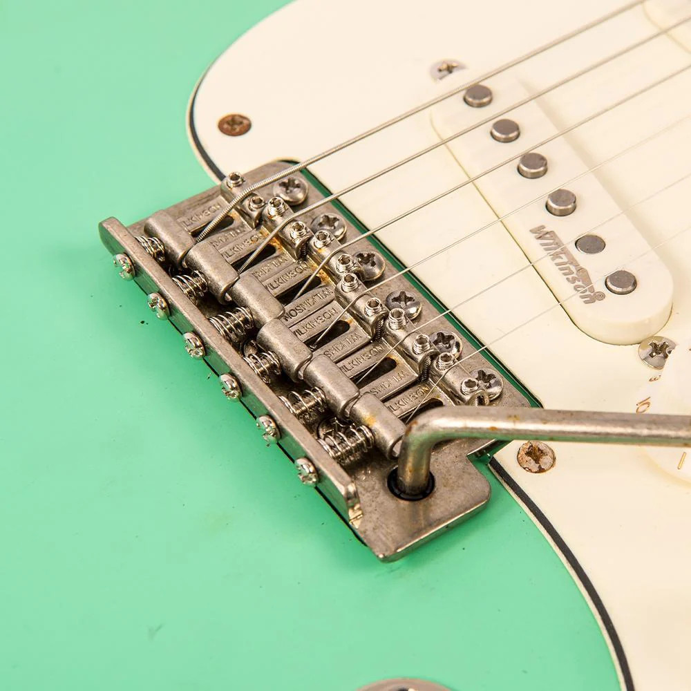 Vintage V6 ICON Electric Guitar in Distressed Ventura Green featuring a relic-style aged finish, Wilkinson hardware and pickups, contoured body, smooth neck profile, and warm vintage-inspired tonal character.