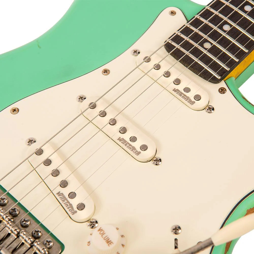 Vintage V6 ICON Electric Guitar in Distressed Ventura Green featuring a relic-style aged finish, Wilkinson hardware and pickups, contoured body, smooth neck profile, and warm vintage-inspired tonal character.