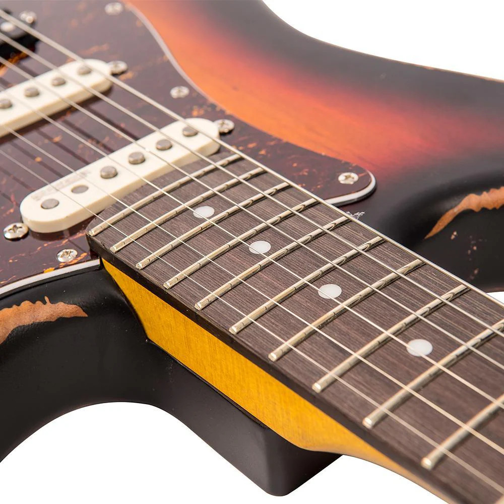 Vintage V6H ICON Electric Guitar in Distressed Tobacco Sunburst featuring an aged relic finish, Wilkinson HSS pickup configuration, contoured body design, smooth-play neck, and classic vintage tone suited for blues, rock, and retro styles.