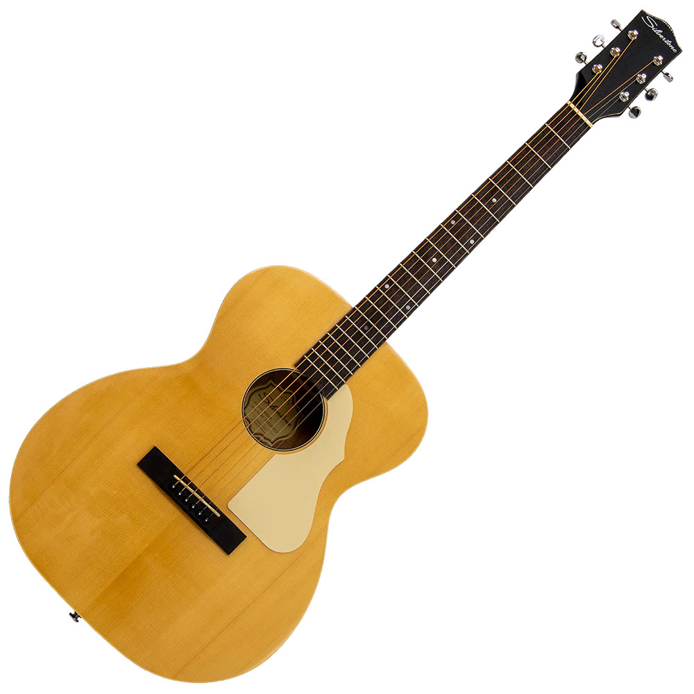 Silvertone 604N Solid Spruce Top Acoustic Guitar in a natural finish featuring a resonant solid spruce top, comfortable neck profile, and warm balanced tone ideal for learning, practicing, and acoustic performance.