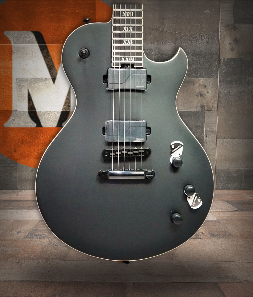 Schecter Solo-II SLS Elite Evil Twin - Satin Black (1338) featuring an ultra-thin SLS neck, premium humbuckers, contoured single-cut body, and stealth satin black finish engineered for high-performance metal and rock.