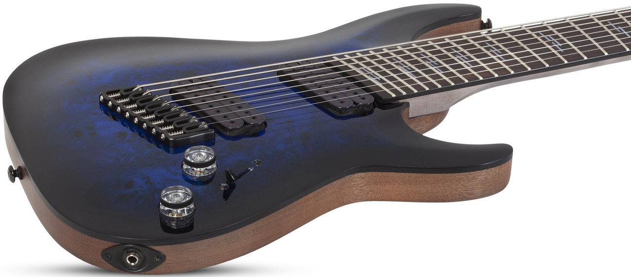 Schecter Omen Elite-8 MS 8-String – See-Thru Blue Burst (2467-SHC) featuring multiscale fingerboard, high-output humbuckers, contoured body, and a stunning figured top designed for modern extended-range performance.