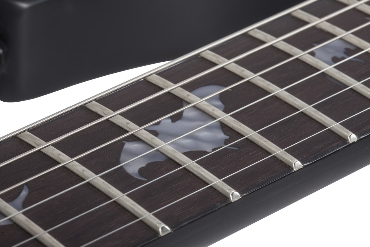 Schecter Damien-6 Left-Handed â€“ Satin Black (2473) featuring high-output pickups, arched top body, fast maple neck, and sleek satin black finish designed for modern heavy playing.